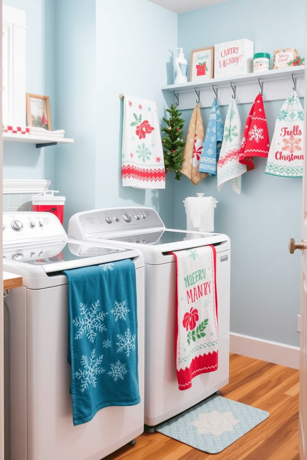 A cozy winter laundry room adorned with colorful dish towels featuring festive snowflakes and holiday motifs. The walls are painted a soft blue, and the floor is covered with a warm wooden finish, creating a cheerful atmosphere.