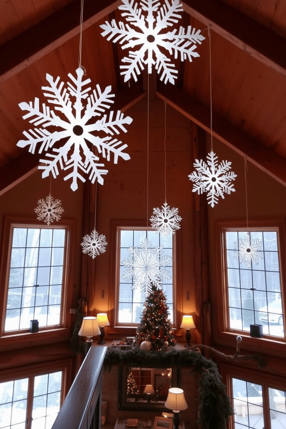 Artistic snowflake decorations adorn the large windows of a cozy winter loft. The space features a rustic wooden beam ceiling and warm, inviting lighting that enhances the seasonal charm.