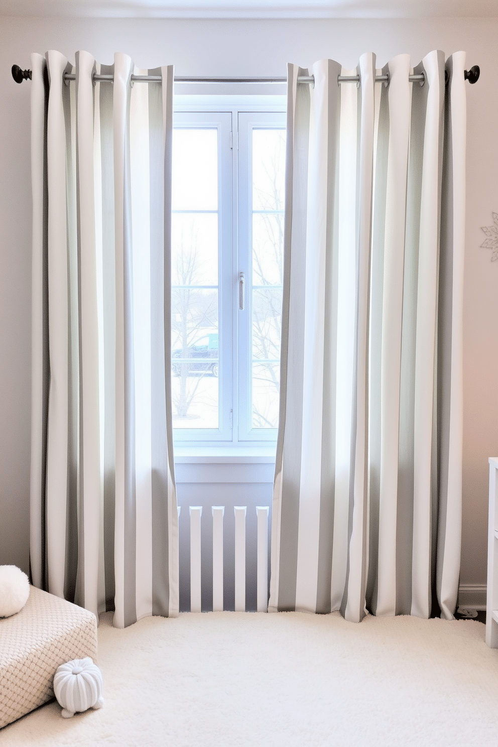 A cozy winter nursery setting with gentle gray and white striped curtains framing the window. The curtains softly diffuse the natural light, creating a warm and inviting atmosphere for the space.