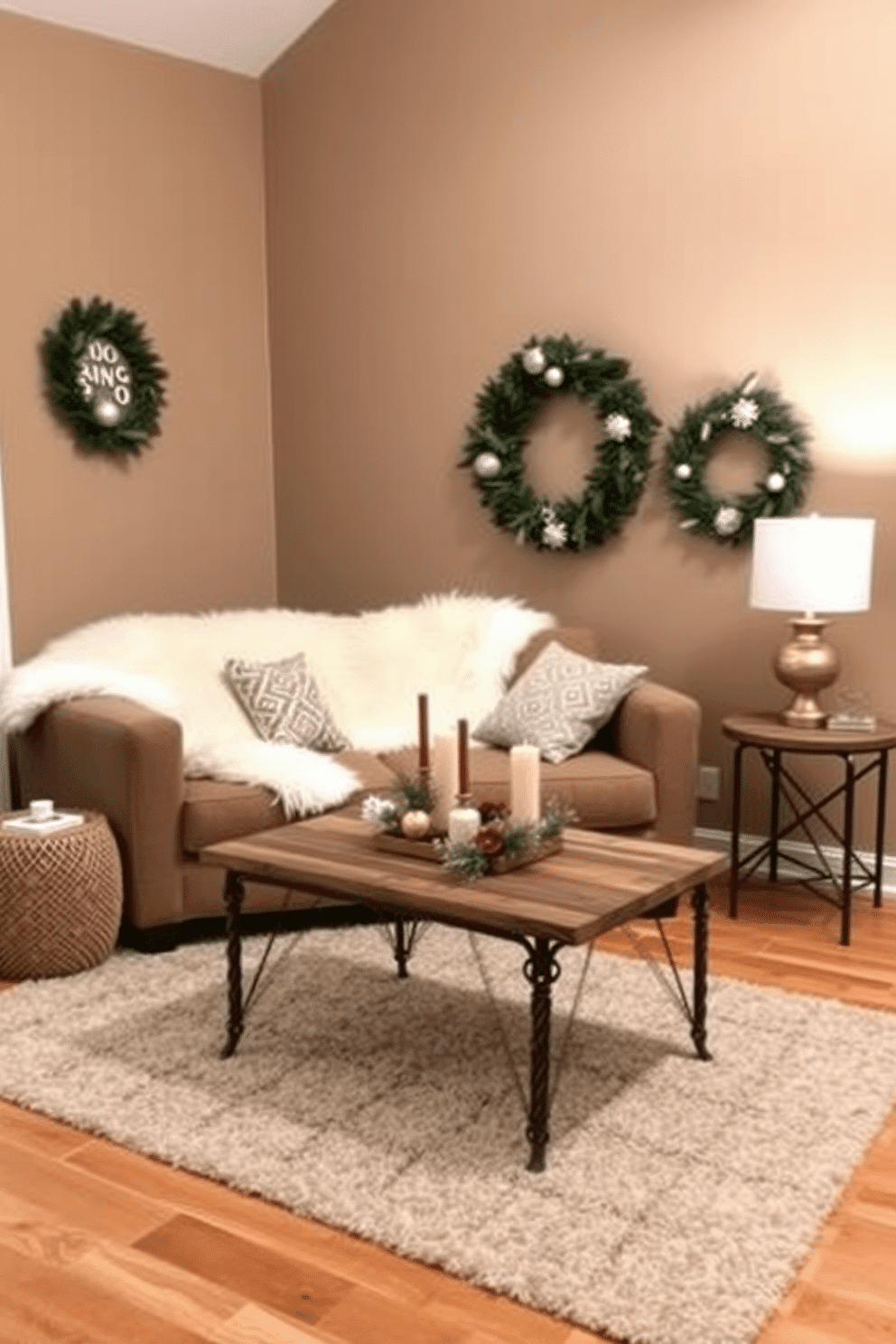 A cozy winter living room designed for a small space. A plush sofa is adorned with a faux fur throw in a soft cream color, creating an inviting atmosphere. The walls are painted in a warm taupe shade, enhancing the room's warmth. A small coffee table made of reclaimed wood sits in front of the sofa, topped with a few decorative candles and a seasonal centerpiece.