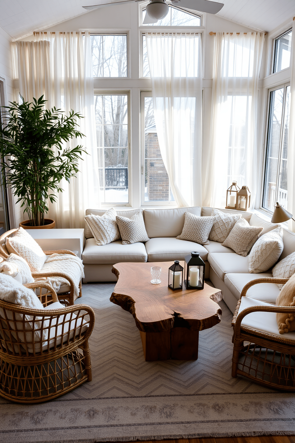 A cozy winter sunroom filled with natural light. The space features a plush cream-colored sectional sofa adorned with textured throw pillows and a soft knitted blanket. A wooden coffee table with a live edge finish sits in the center, surrounded by woven rattan chairs that add warmth. Large windows draped with sheer white curtains allow sunlight to filter in, creating a serene atmosphere. In one corner, a tall potted plant adds a touch of greenery, while a soft area rug anchors the seating area. Decorative lanterns and candles provide a warm glow during the evening, enhancing the inviting ambiance.