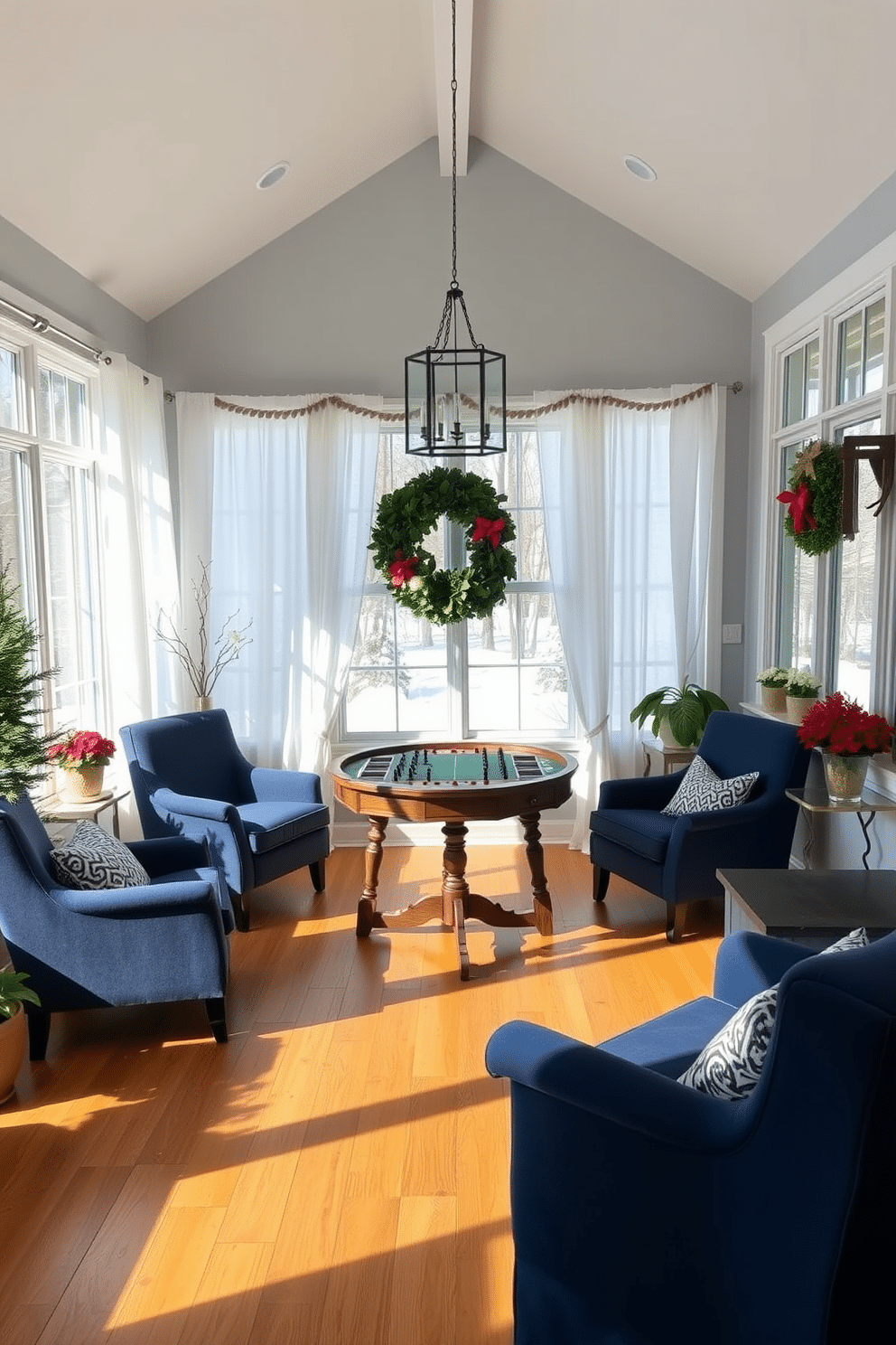 A cozy winter sunroom filled with natural light. The space features large windows with soft white drapes and a warm wooden floor that enhances the inviting atmosphere. In the center, there is a fun game table surrounded by comfortable upholstered chairs in a rich navy blue. The walls are painted a light gray, adorned with seasonal decor and potted plants that bring a touch of nature indoors.