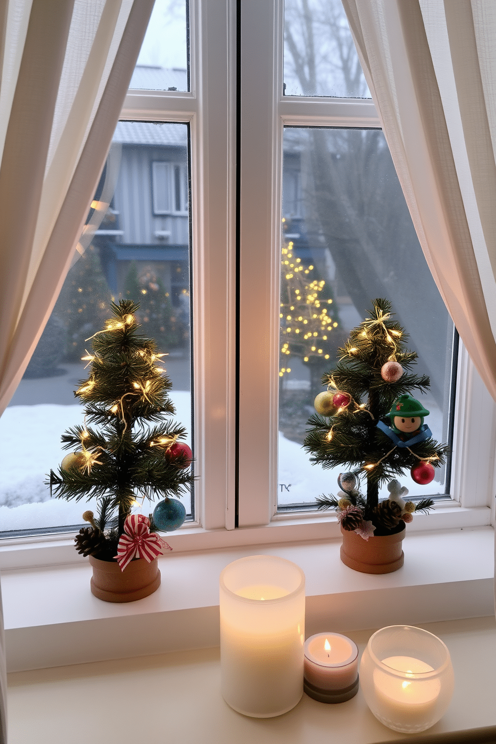 Miniature Christmas trees are placed on the windowsills, adorned with twinkling fairy lights and colorful ornaments. Each tree is surrounded by small decorative elements like pinecones and festive ribbons to enhance the winter charm. The windows are draped with soft, sheer curtains that allow natural light to filter through while adding a cozy feel. Frosted glass candle holders are positioned nearby, casting a warm glow and creating a welcoming atmosphere for the holiday season.