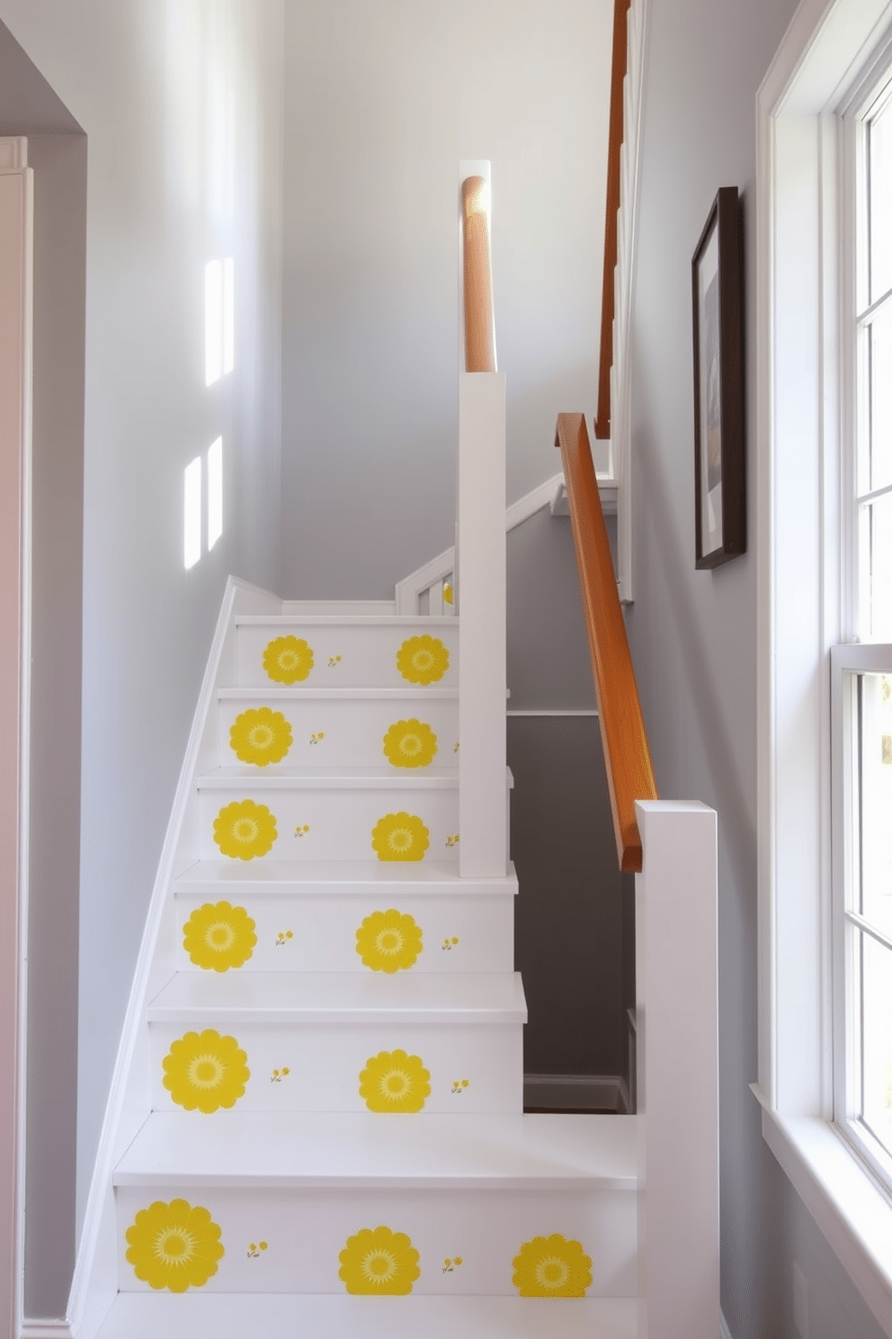 A bright and cheerful staircase featuring yellow floral decals on the risers, creating a vibrant contrast against the white steps. The walls are painted in a soft gray, complementing the lively decor while allowing the yellow accents to stand out. The staircase is adorned with a sleek wooden handrail that adds warmth to the design. Natural light floods the space through a nearby window, highlighting the playful patterns and inviting a sense of joy into the home.